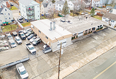 Gardner of DMG Brokerage and Azubuike of Home America Realty sell 7,327 s/f auto body shop for $3.602 million